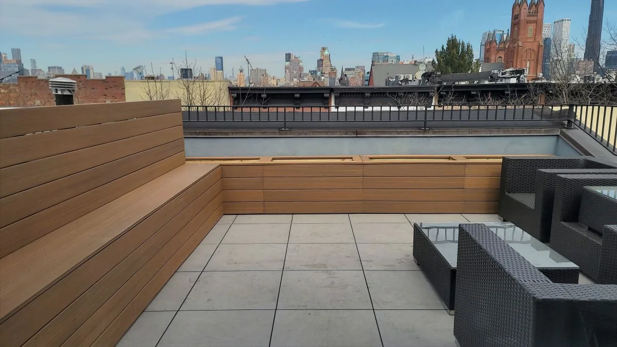 Carroll Gardens rooftop project combining porcelain pavers and Fiberon composite decking